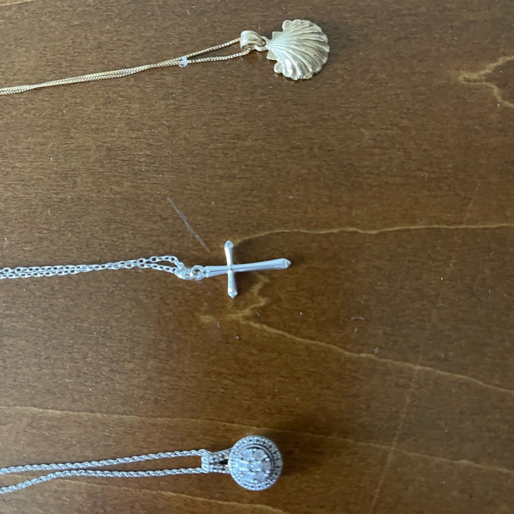 Three 20 inch necklaces. Two sterling silver, one 10k gold.
